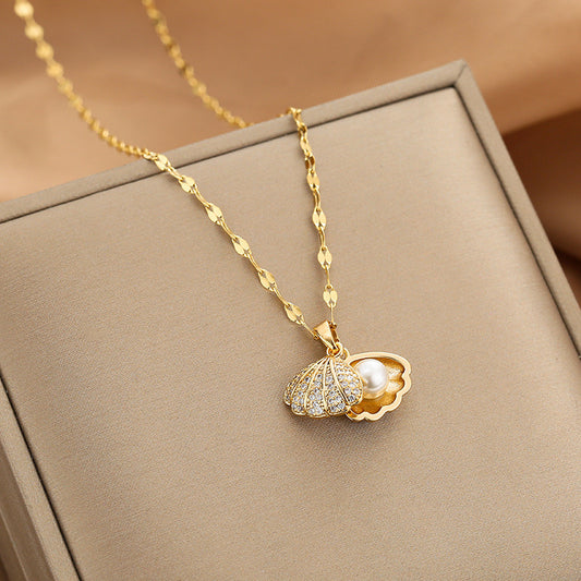 Pearl Shell Necklace showcasing delicate shell pendant with lustrous pearl accent