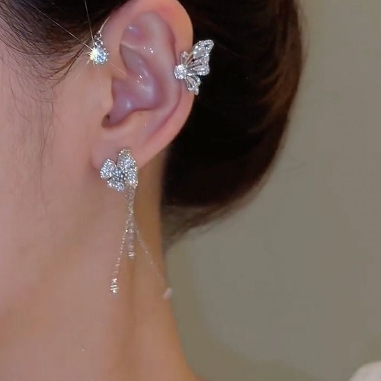Model wearing Graceful Butterfly Ear Cuffs with tassel design