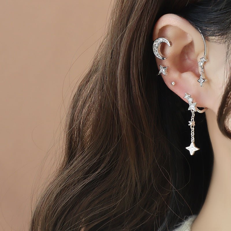 Gold finish Star and Moon Earrings with celestial motifs
