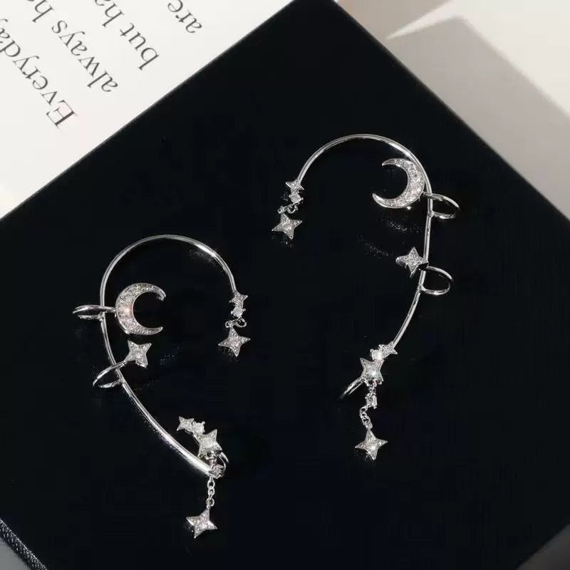 Silver Star and Moon Earrings featuring star and moon accents