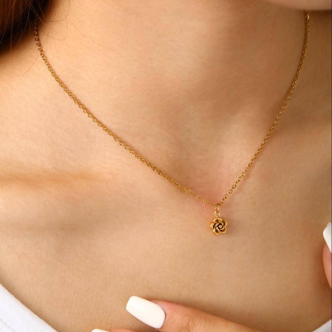 Model wearing Rose Flower Necklace, side view highlighting design