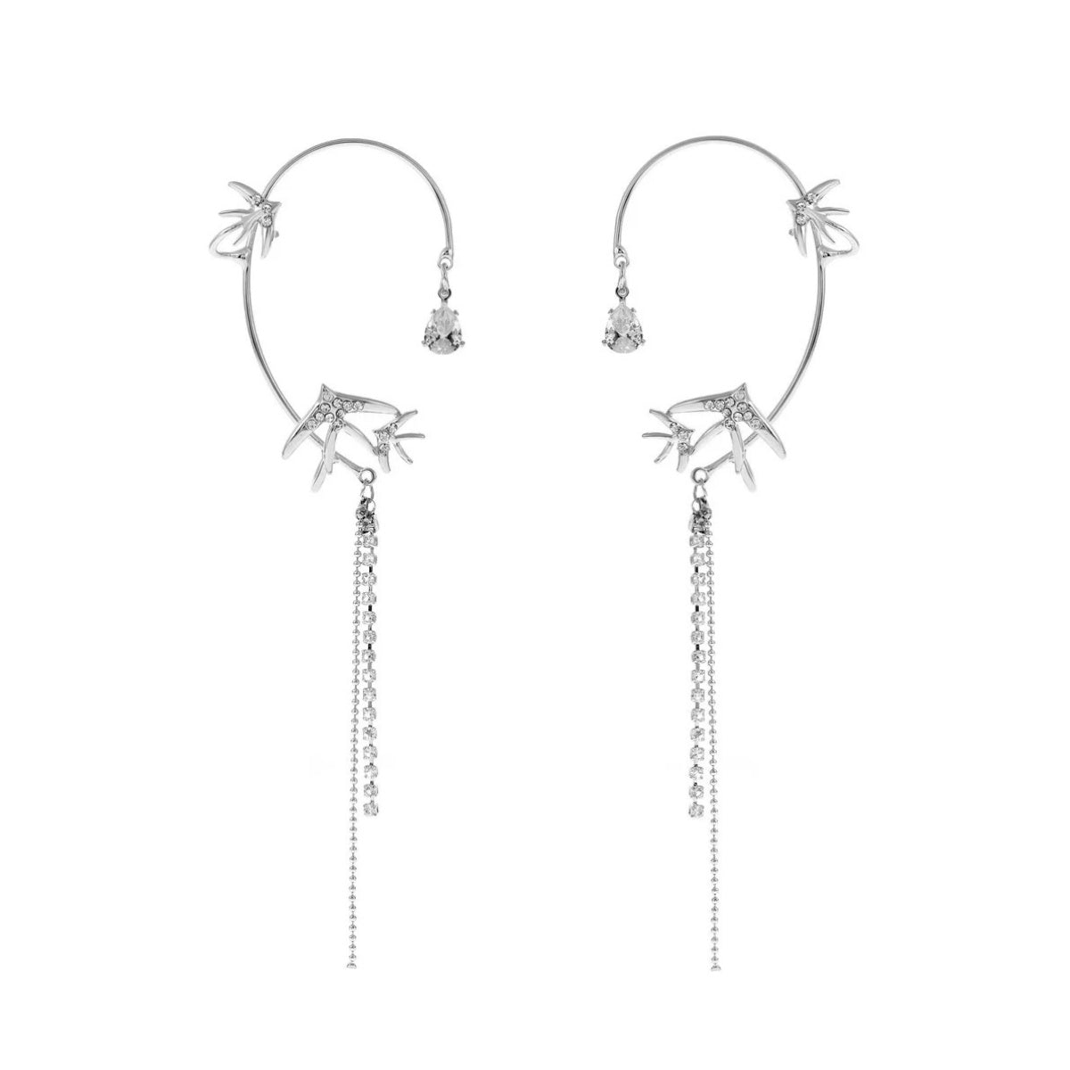 Close-up of Star Swallow Ear Cuffs showcasing star and swallow motifs