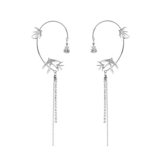 Close-up of Star Swallow Ear Cuffs showcasing star and swallow motifs