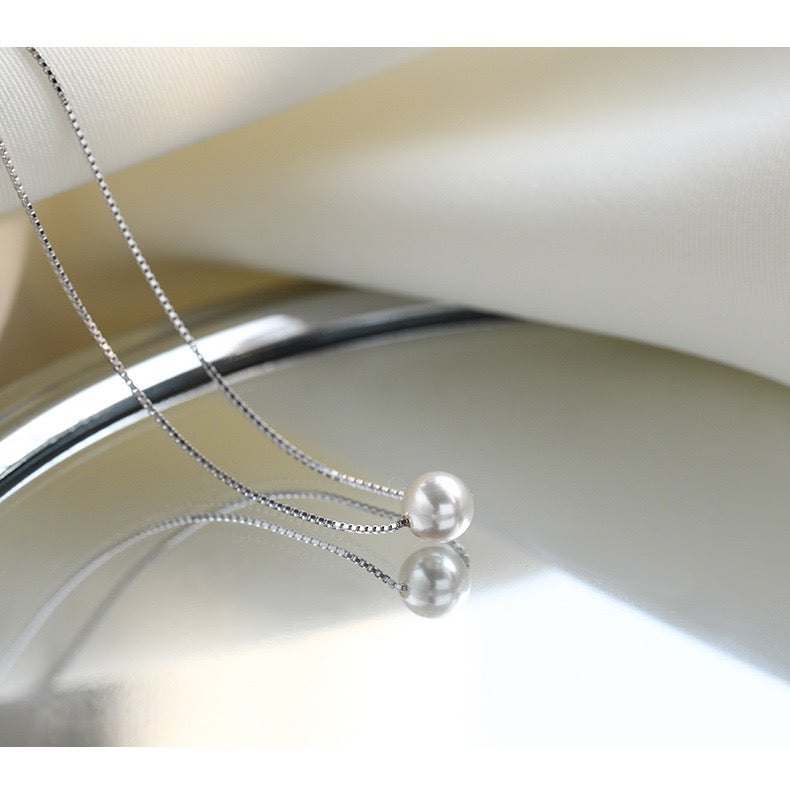 Detailed view of the lustrous pearls in Eternal Pearl Necklace