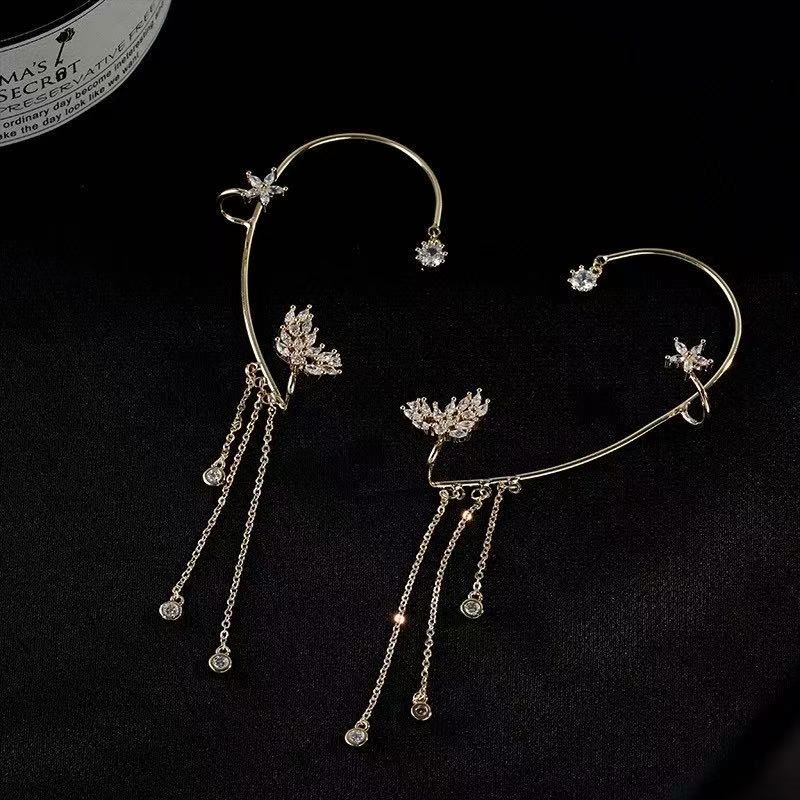 Close-up of Tassel Butterfly Ear Cuffs with delicate butterfly motif and flowing tassels