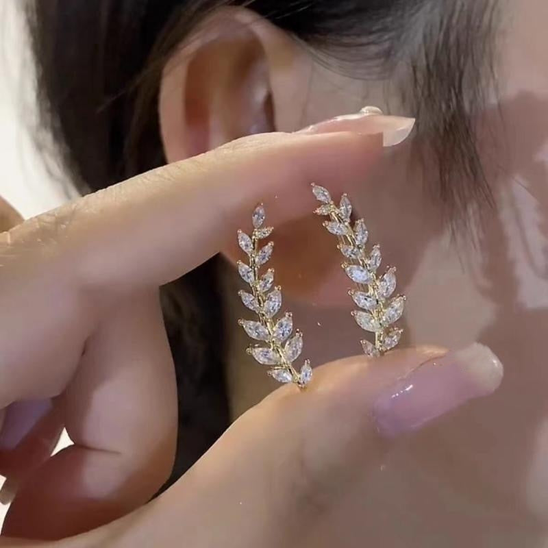Model wearing Wheat Ear Earrings with chic outfit
