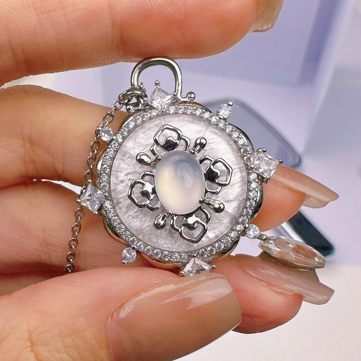 Lifestyle image featuring Glittering Heart Necklace with elegant outfit