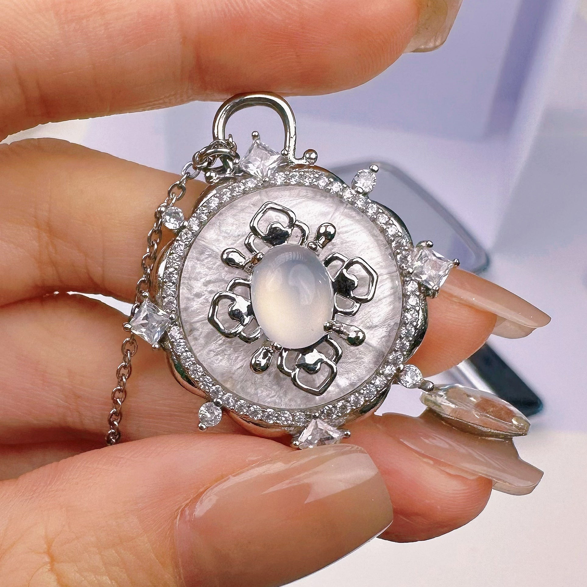 Lifestyle image featuring Glittering Heart Necklace with elegant outfit