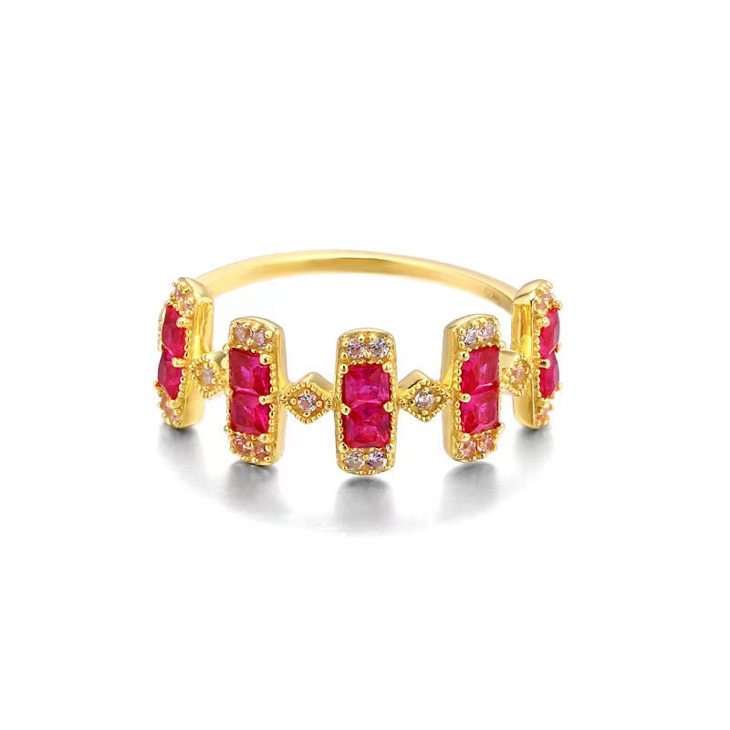 Ruby Blossom Ring with vibrant red gemstones