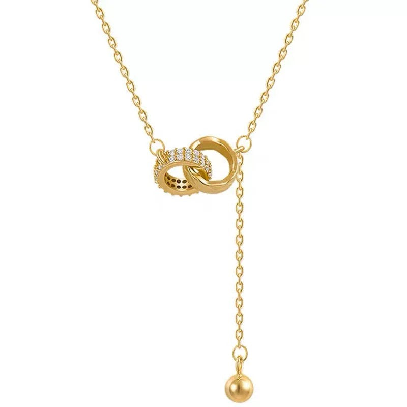 Lifestyle image with outfit styling featuring the necklace