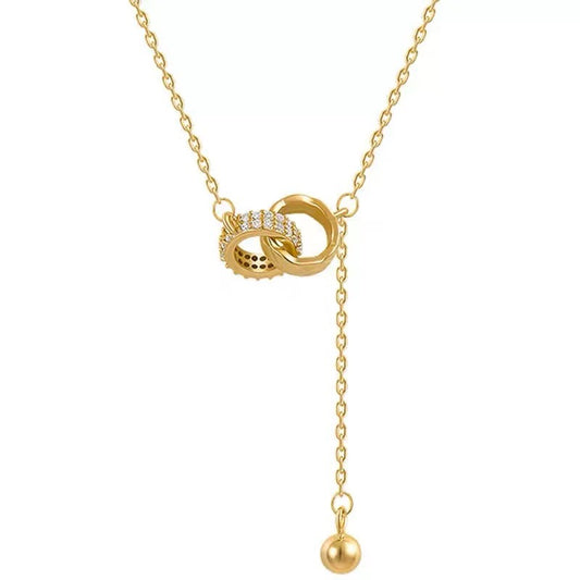 Lifestyle image with outfit styling featuring the necklace
