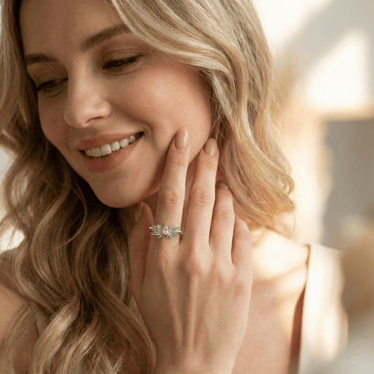 Model wearing Forest Butterfly Ring showcasing delicate butterfly wings and adjustable open band