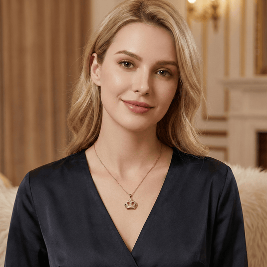 Model wearing crown pendant necklace showcasing regal elegance and adjustable chain fit