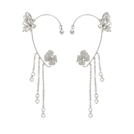 Model wearing Tassel Butterfly Ear Cuffs with celestial stars and moon design