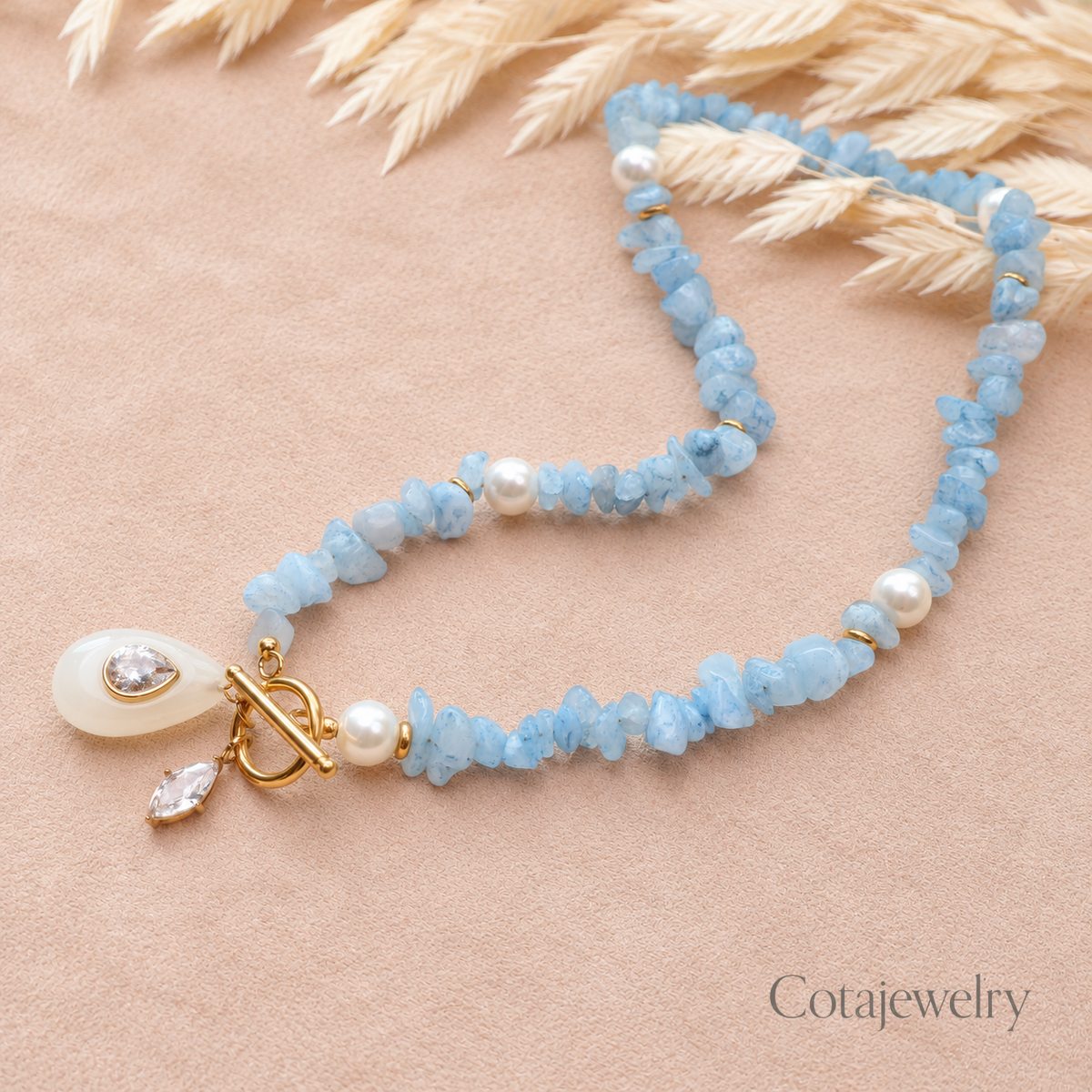 COTA Pink Bead Charm Necklace in Pale Blue Bead