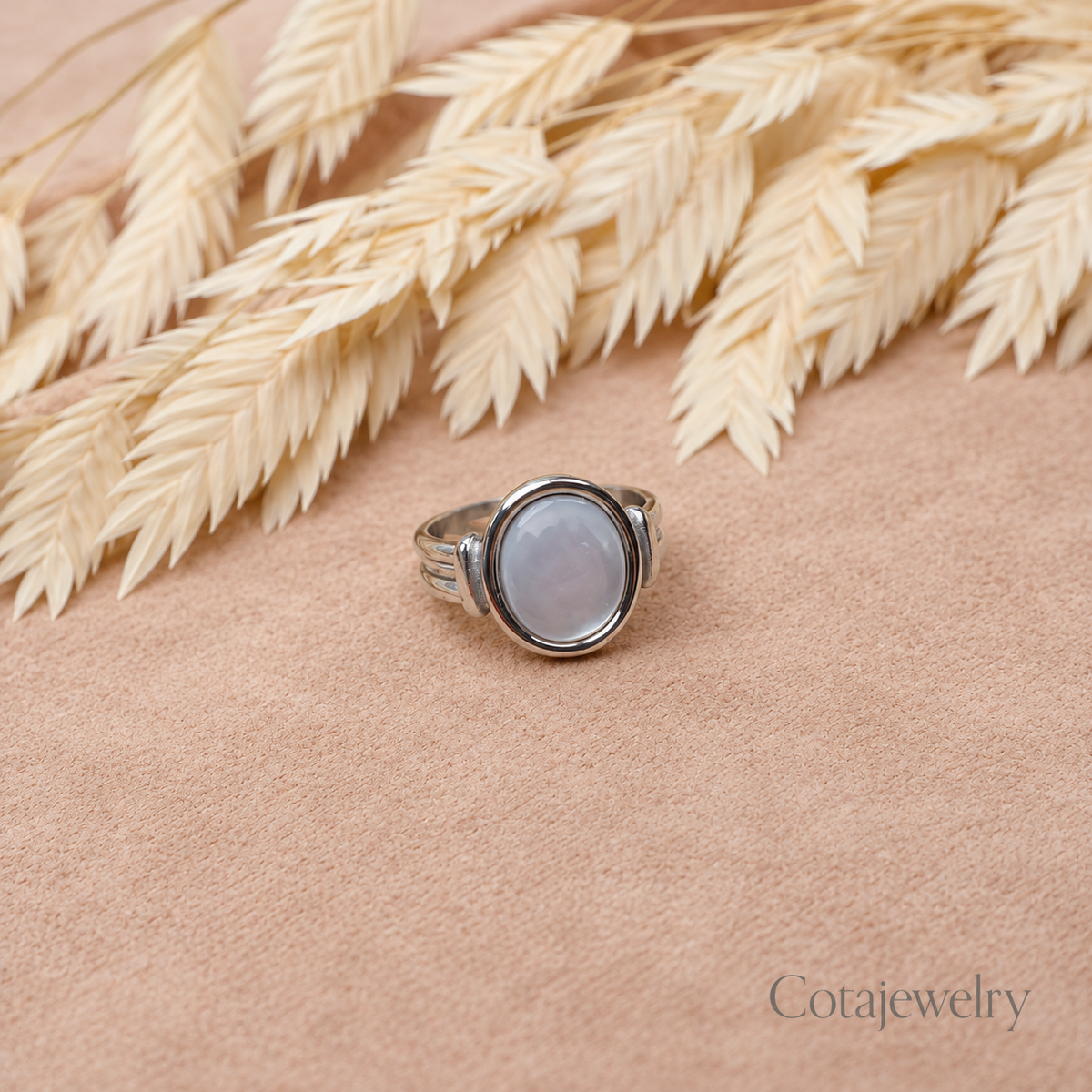COTA-ring met hartvormige cabochon van parelmoer in zilverkleurig metaal