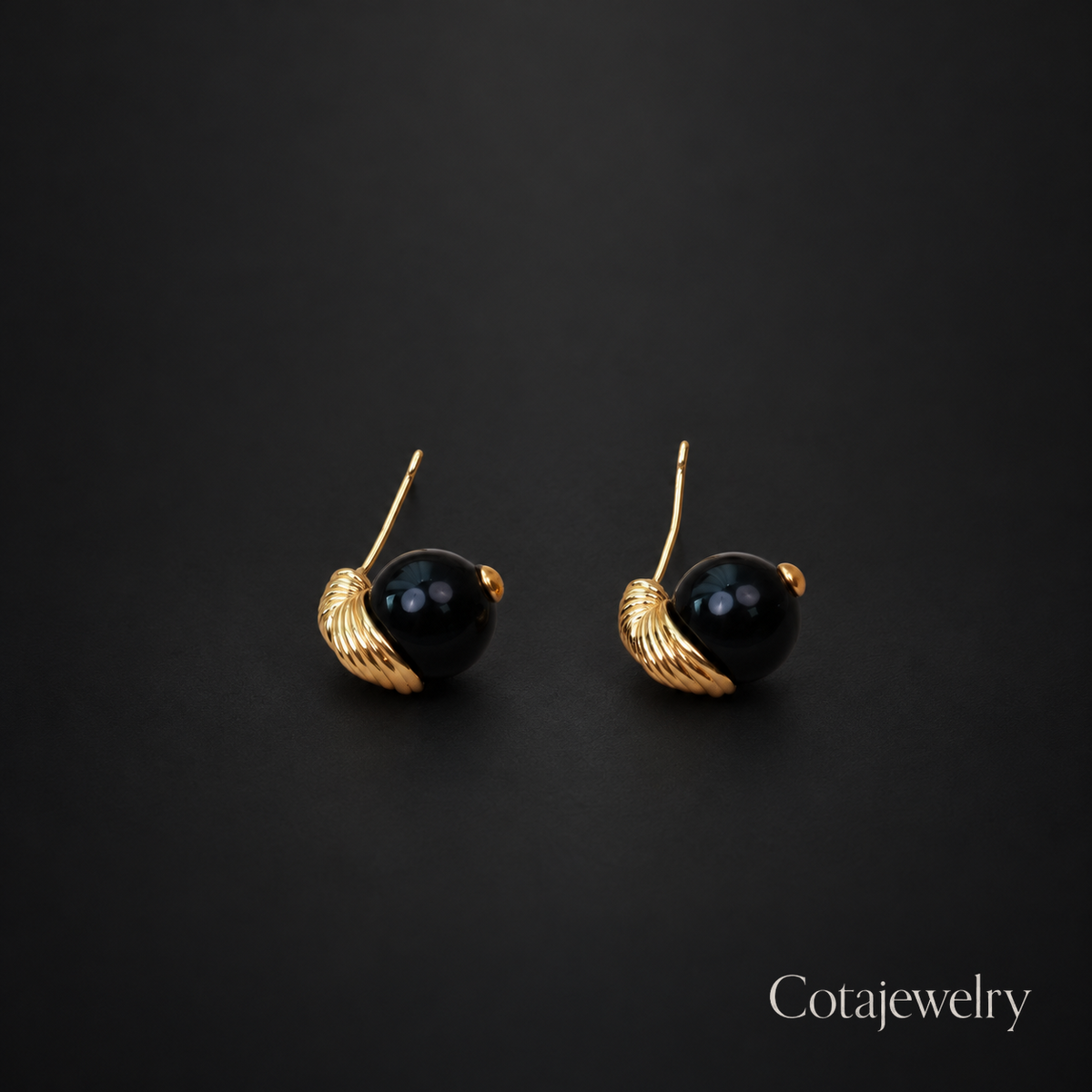 COTA Black Orb Drop Earrings in Gold Tone