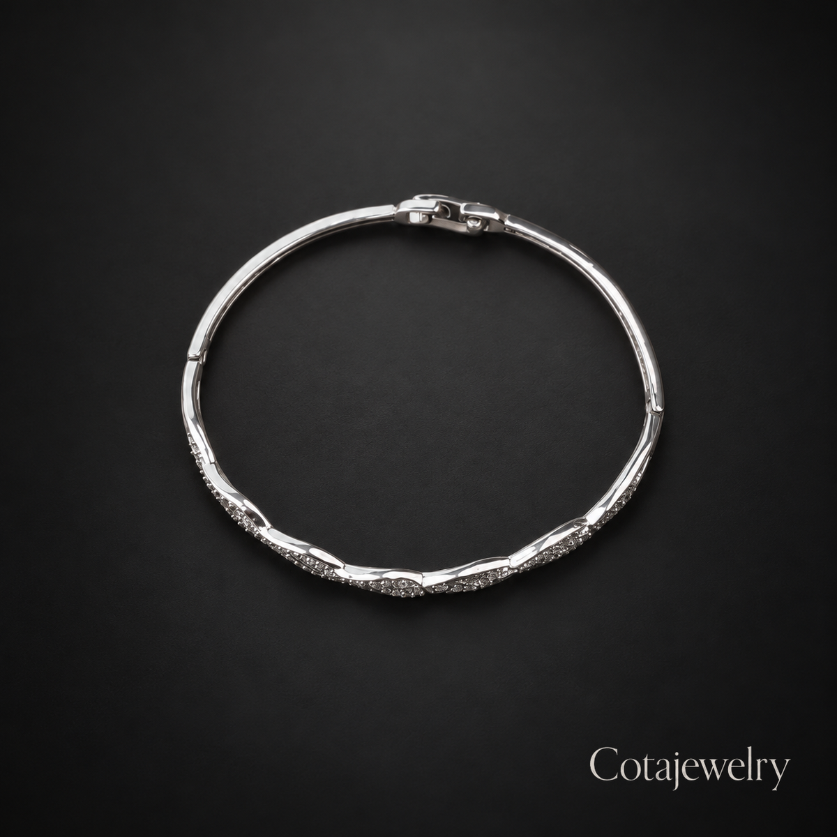 Bracciale scolpito COTA color argento
