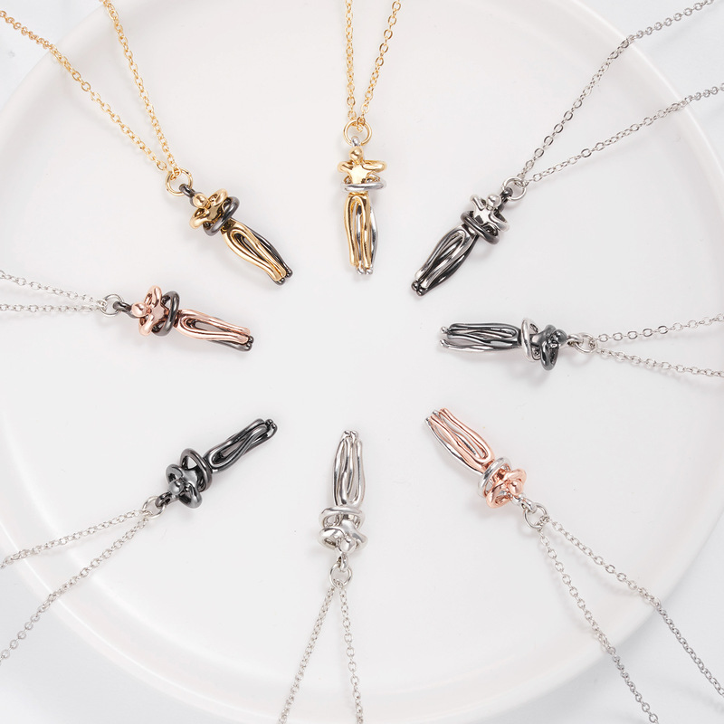 Close-up of Embrace Pendant Necklace detailing