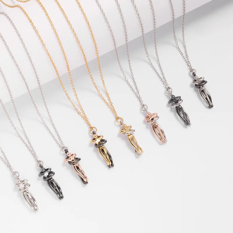 Handcrafted human figure-inspired pendant by CotaJewelry