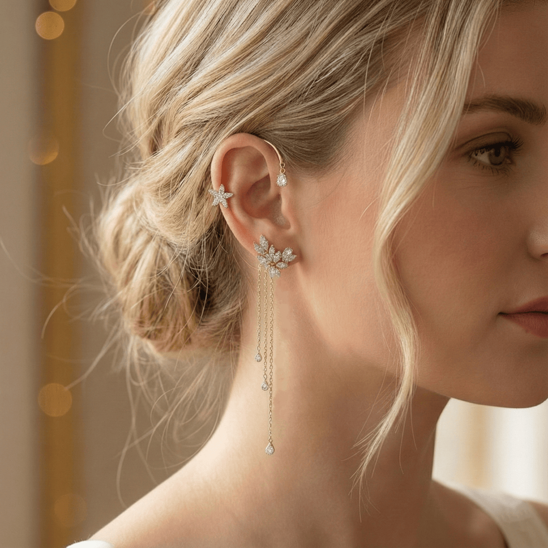 Model wearing gold butterfly ear cuff 