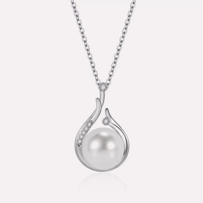 Pearl Drop Necklace by CotaJewelry with teardrop-shaped pearl pendant and gold-plated finish