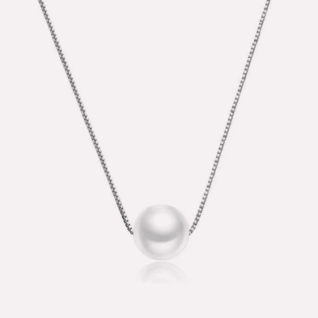 Eternal Pearl Necklace by CotaJewelry with lustrous pearls and gold-plated finish on white background