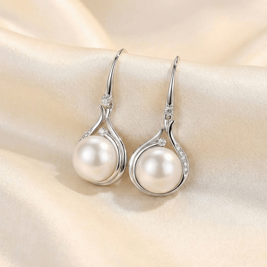 Elegant Pearl Drop Earrings with smooth teardrop pearl and refined polished surface
