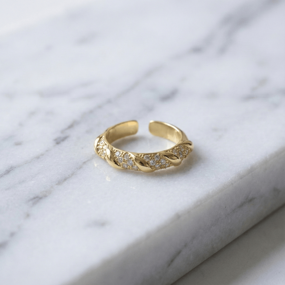 Close-up of Twilight Vine Ring highlighting detailed vine craftsmanship and polished gold-plated surface