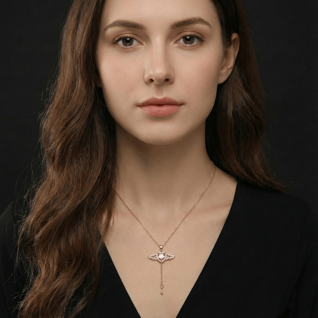 Model wearing Angel Wing Necklace showcasing delicate movable angel wing pendant