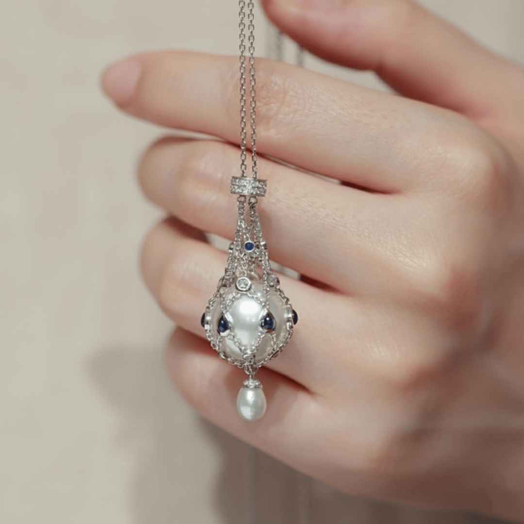 Minimalist lavalier necklace featuring large 20mm imitation pearl and silver-plated setting