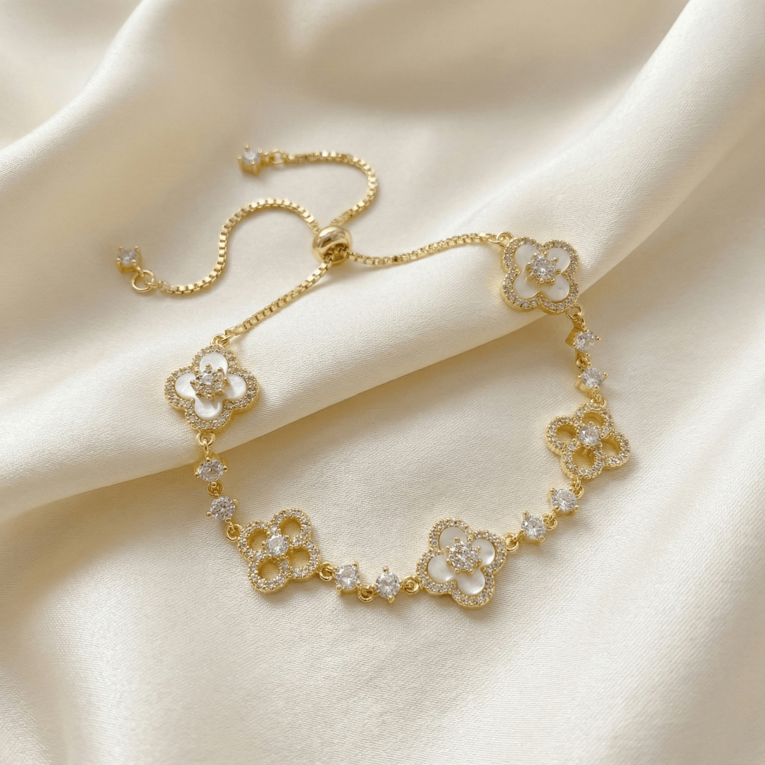 Sakura Cleef Bracelet photographed on a wrist highlighting floral details and elegance