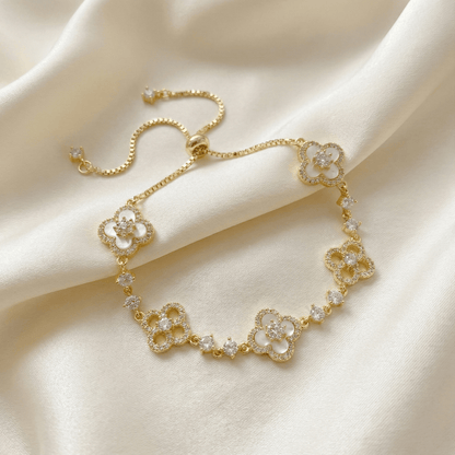 Sakura Cleef Bracelet photographed on a wrist highlighting floral details and elegance