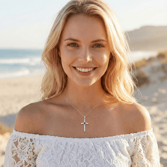 Model wearing 925 sterling silver cross necklace with birthstone, dainty faith jewelry for daily wear