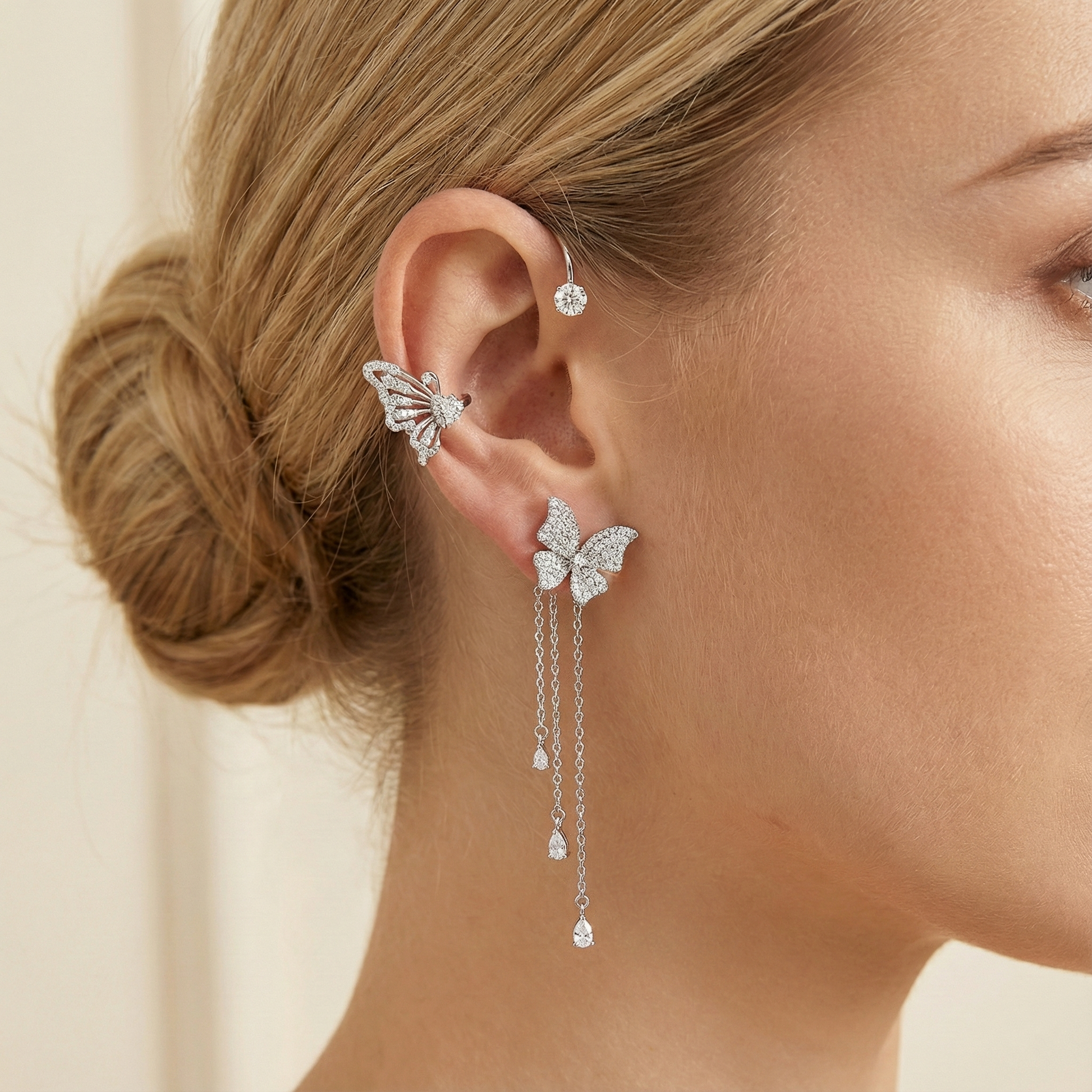 Model wearing Graceful Butterfly Ear Cuffs with tassel design