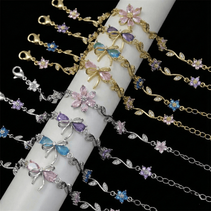 Close-up of bow bracelet detailing cubic zirconia sparkle and gold-plated craftsmanship