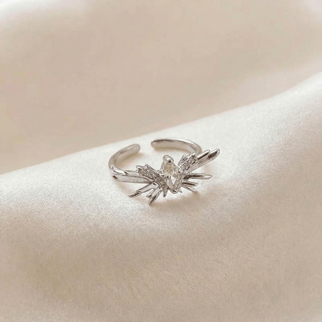 Close-up of Forest Butterfly Ring highlighting detailed butterfly wing craftsmanship and polished finish