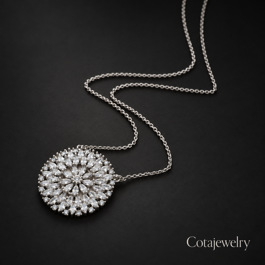 COTA Crystal Sunburst Pendant Necklace in Silver Tone