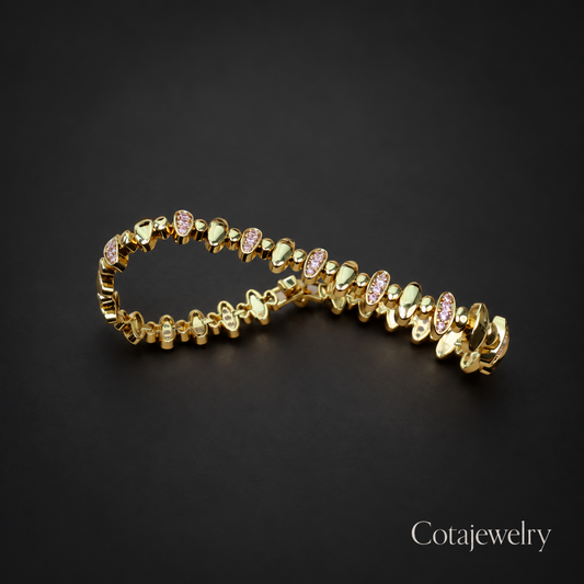 Pulseira COTA com elos de pétalas rosa