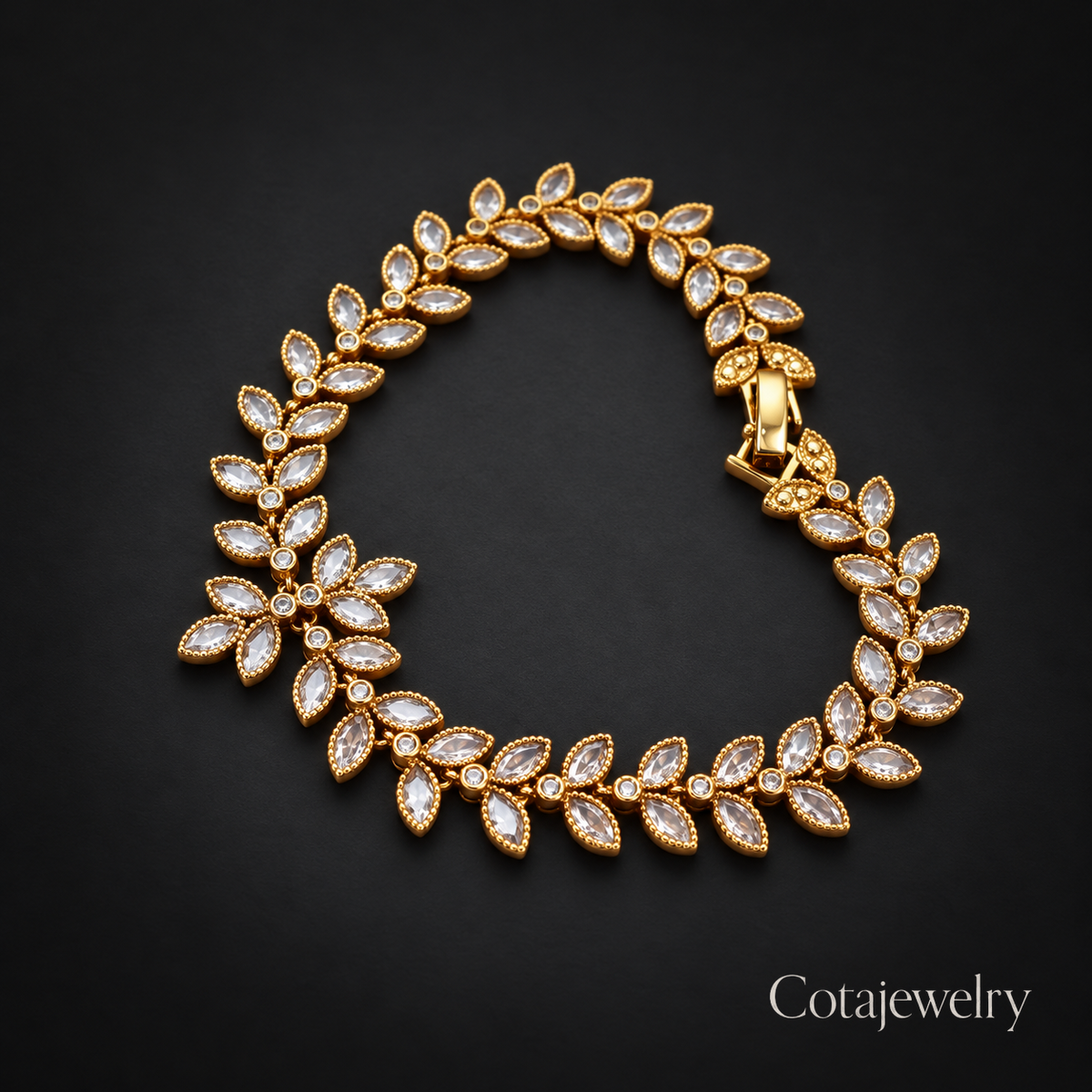COTA Leaf Crystal Bracelet in Gold Tone