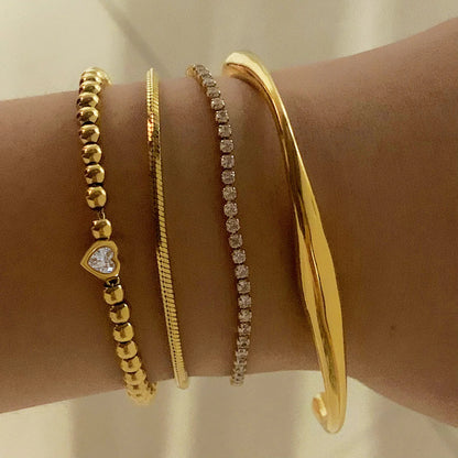 Bracelet chaîne tennis à cœur perlé en acier inoxydable