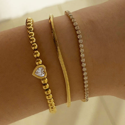 Bracelet chaîne tennis à cœur perlé en acier inoxydable