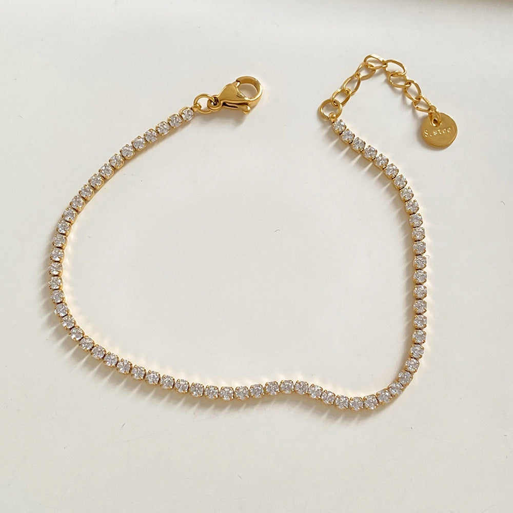 Bracelet chaîne tennis à cœur perlé en acier inoxydable