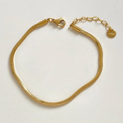 Bracelet chaîne tennis à cœur perlé en acier inoxydable